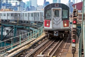 Take the train ten minute to the Cardinal building from Manhattan