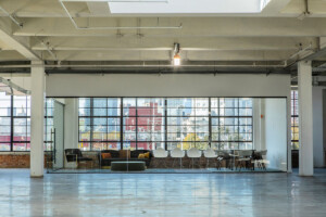Open shared office with sunny views on the third floor of the Cardinal Building