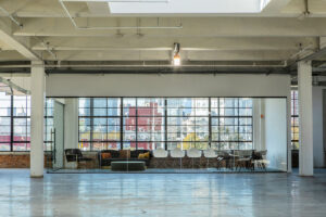 Open shared office with sunny views on the third floor of the Cardinal Building